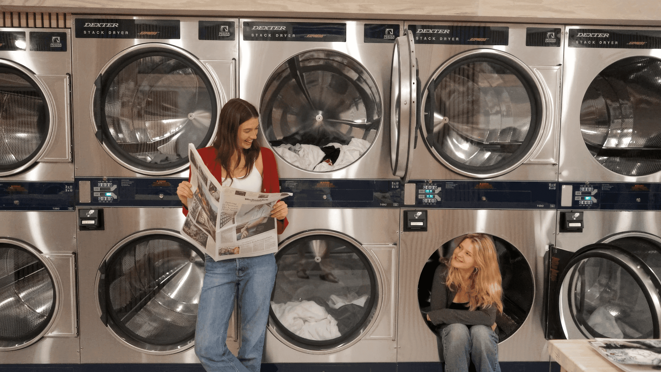 Customers enjoying a bright modern laundry space